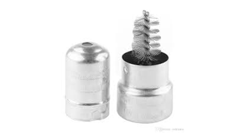 5. After rinsing with water, use a battery brush to clean the cable ends and the battery posts. Turn it at least 3 or 4 times around in order to remove all corrosion that is build up inside the clamp.