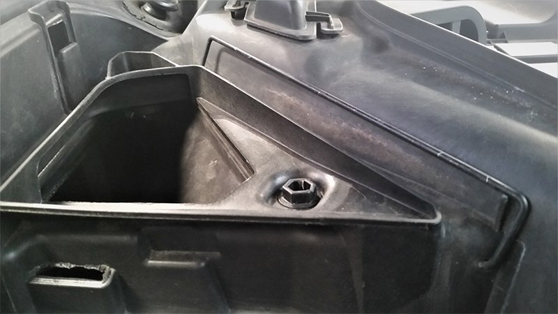 Unclip the metal retainer on both the cabin filters, disconnect the hood switch and the sensor next to it, and lift the cabin filter units out of the plenum. Now is a good time to replace the cabin filters if you haven’t done so recently.